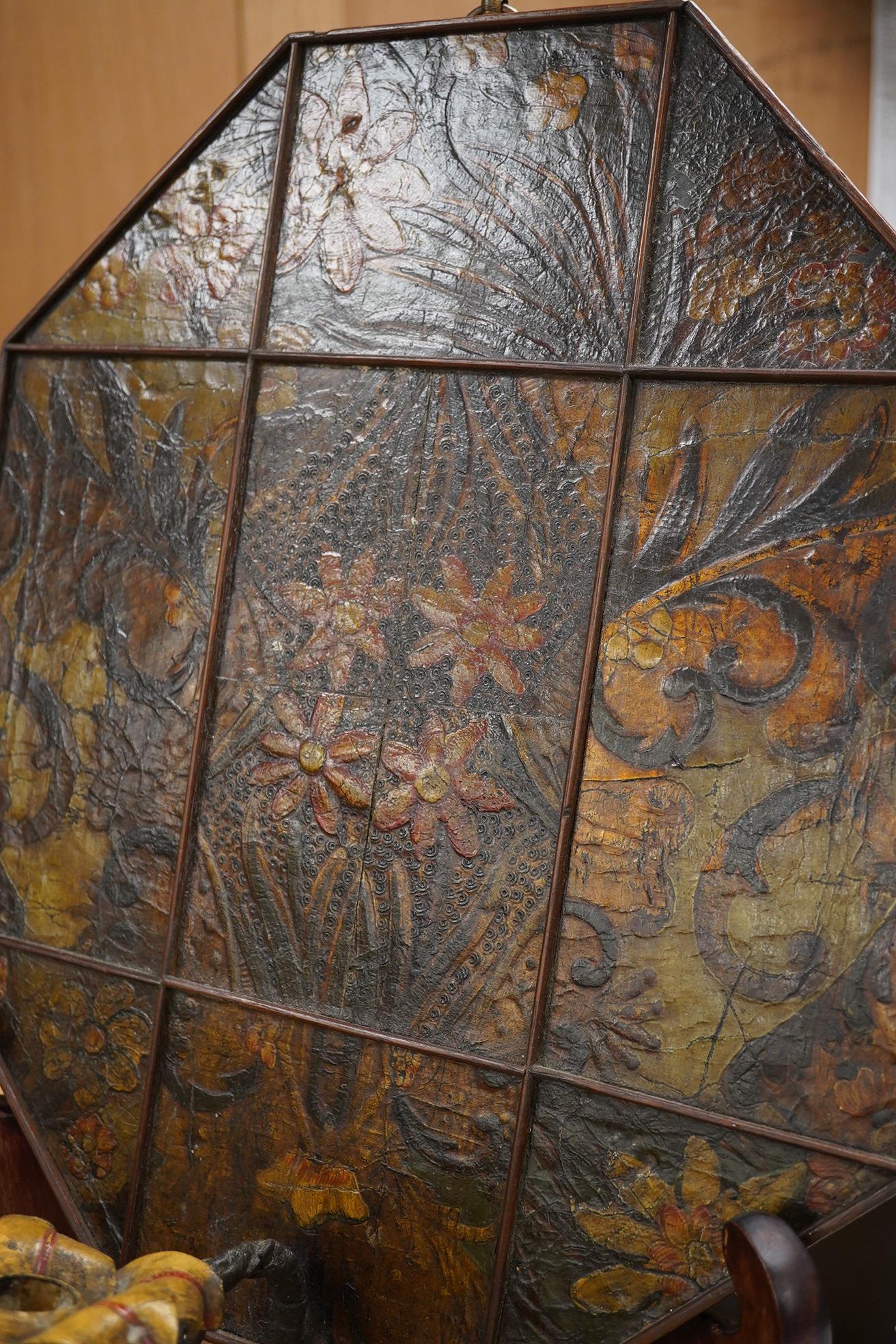 An octagonal 18th century and later, leather wall sconce, 48cm high. Condition - one piece detached